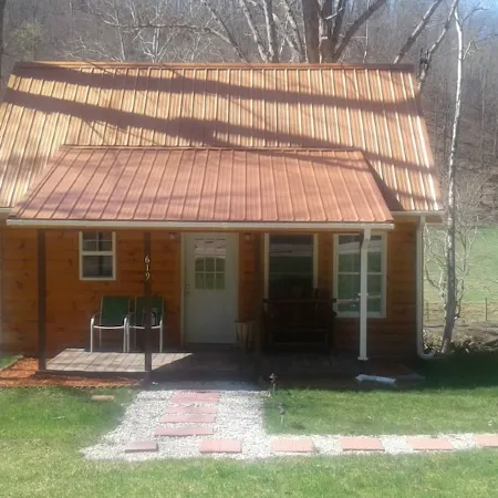 Quaint, secluded cabin with the feel of home. Sleeps 4 with home-like amenities.