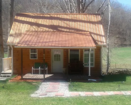 Quaint, secluded cabin with the feel of home. Sleeps 4 with home-like amenities. Hotels in Menifee County