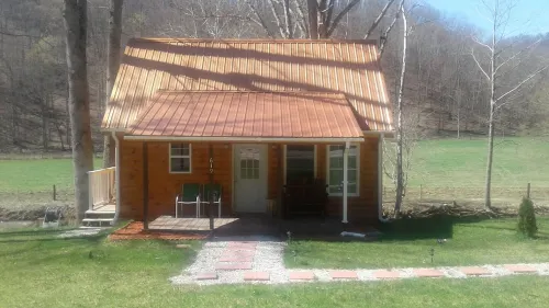 Quaint, secluded cabin with the feel of home. Sleeps 4 with home-like amenities.