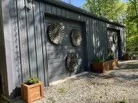 Barndominium on Private 6 Wooded Acres Near Bentonville–RV Hookup