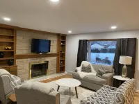 Newly Remodeled Brick Home with wall Sculptures by the Airport
