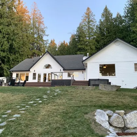 Amazing sunsets!! Water view, hot tub, close to town, fire pit.