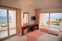 Oyster Bay Beach Suites Hotel dekat Bridge of Royal Tulip Beach Resort