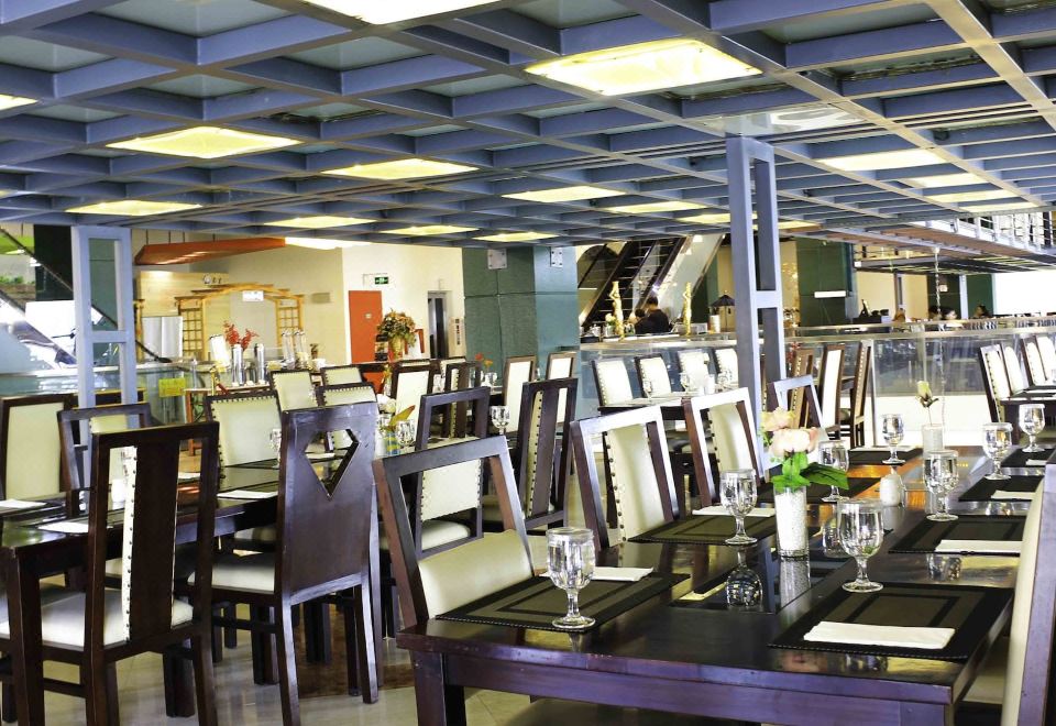 Amos Cozy Hotel MelawaiOver view