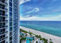 Ocean View Balcony and Premium Amenities - Luxurious Beachfront Retreat