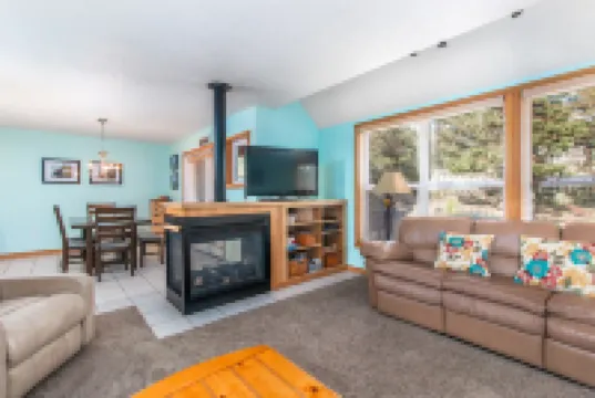 Coastal Escape with Outdoor Patio and Bikes - Charming Modern Retreat