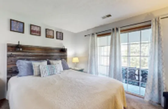 Single-level condo with screened patio & pond views