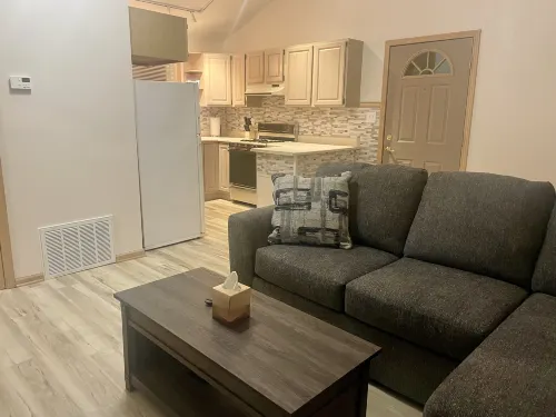 Gas Fireplace and Outdoor Landing with Seating - Charming Oasis Hotels in La Porte