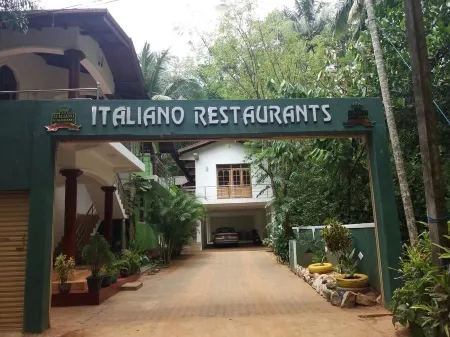Italiano Restaurans Отели рядом с достопримечательностью «Sri Muthumari Amman Kovil»