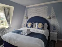 The MAD Hatter's Guestrooms