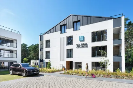 Sea Shell Apartments Łukęcin Отели в г. Дзивнув