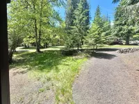 Charming 2-bedroom cabin with lake views offering a quiet, lake-side retreat.