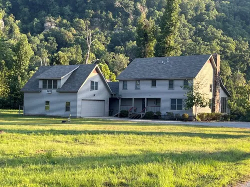 Spacious family home on the banks of the Little Red River in Heber Springs AR.