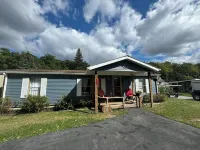Lakeside Cozy Cottage - w Fishing Dock, Relaxing Lake Freeman, close to Purdue