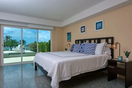 Walk to Eagle Beach – Exclusive 6Br Beachfront Condo with Private Pool & Jacuzzi