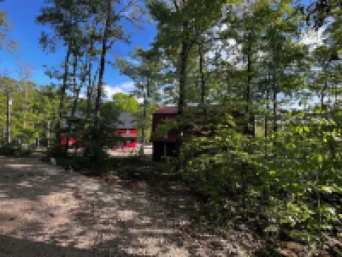 Cozy cabin in our little woodland village - access to pond and meadow
