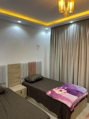 Cozy 2-bedroom apartment in wonderful Giza Governorate with AC, WiFi Отели рядом с достопримечательностью «Миср Юниверсити фор Сайенс & Текнолоджи»
