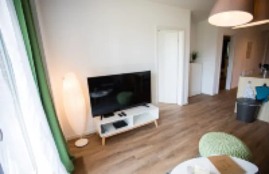 Modern, bright apartment with terrace, directly behind the dike, in the North Sea resort Wremen