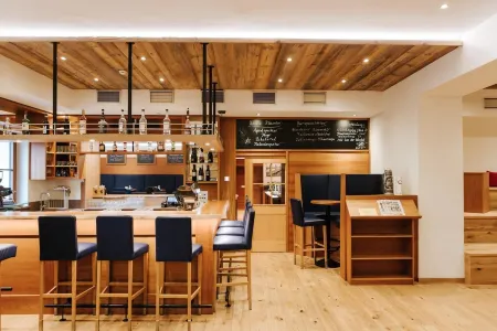 Hotel der Stockinger Отели в г. Гундерсдорф