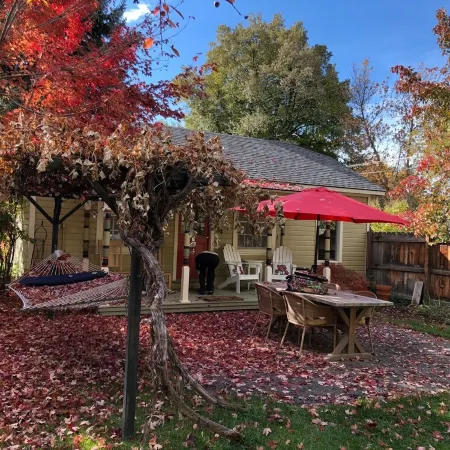 Charming studio cottage on quiet street with beautiful landscaping and gardens.