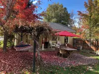 Charming studio cottage on quiet street with beautiful landscaping and gardens.