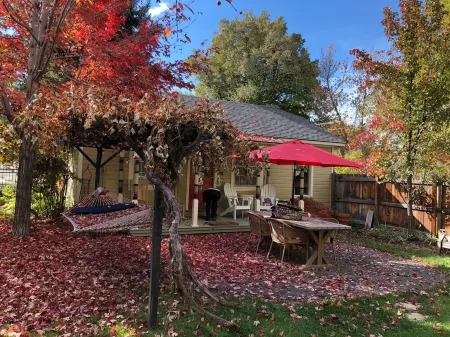 Charming studio cottage on quiet street with beautiful landscaping and gardens.