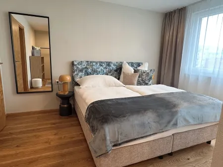 "THREE" - Premium Apartments Seekirchen, modern and central, close to the lake