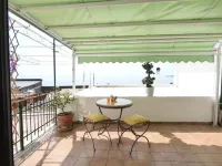 Casa Minu- cozy family home, street level and sea view-