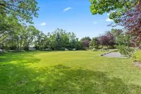 Spacious estate, 12000 square feet on a full acre in East Sandy