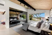 Hillside Luxury MidCentury Rejuvenation SpaRetreat. Views, Pool, Amenities.