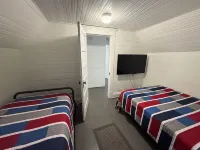 Cozy 2-bedroom cabin in Gilbert. Located close to RockHouse and Devil Anse Trail