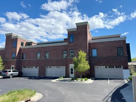 Modern condo on Manistee River just steps away from downtown!