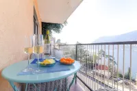 From the apartment and terrace view of the Lake, and with private parking space Hotels in Blevio