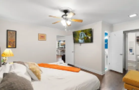 Spacious Open Floor Plan. 5 Beds. 5 TVs Art.