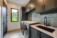Contemporary Naples Home w/ Outdoor Kitchen & Pool - 3-Star