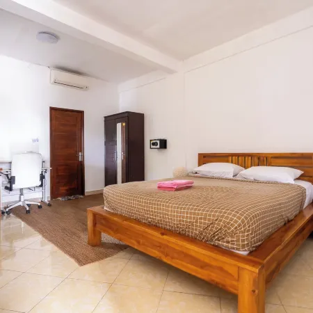 Amed Sari Beach Guesthouse Отели рядом с достопримечательностью «Пляж Амед»