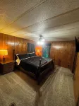 Quiet cabin in the woods w/ access to pools, river, & lakes in gated community!!