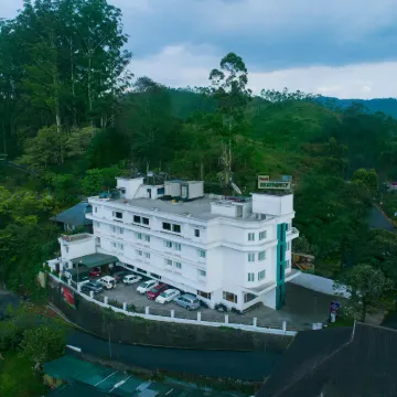 Issacs Residency Hotels near Munnar Tea Museum