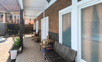 Urbanview Hotel Villa Q Gisting