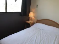 Business Hotel Tsuru Hoteles en Izumi