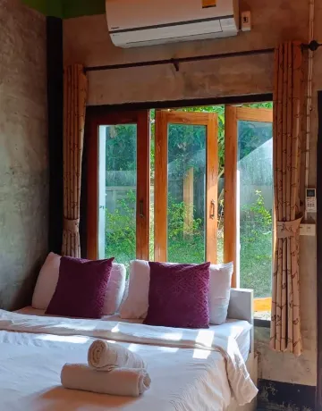 ห้องดีลักซ์พร้อมเครื่องปรับอากาศ