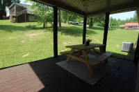 Newly remodeled,  handicap accessible overlooking pool , play area