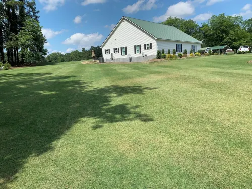 Golf Destination w/ Private Driving Range w/ Lights, and Bar.