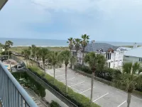 Pelicans Condos featuring a three bedroom two bath ocean view condo.