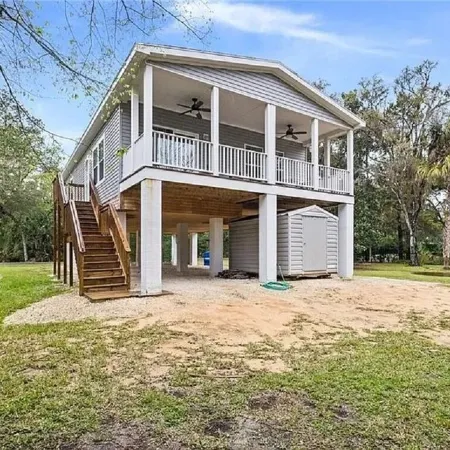 Waterfront home with dock and boat ramp