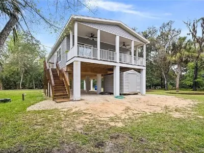 Waterfront home with dock and boat ramp