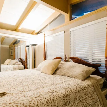 Monterey craftsman style home with vaulted exposed-beams ceiling hardwood floor