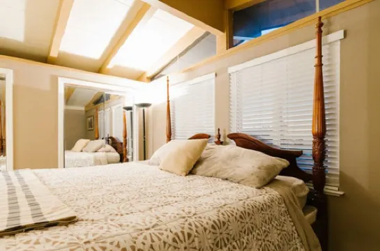 Monterey craftsman style home with vaulted exposed-beams ceiling hardwood floor