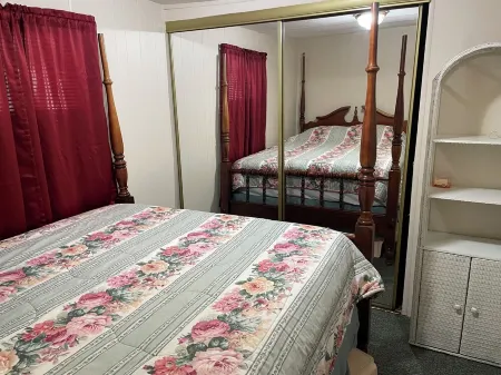 Vacation Stay at Hubbard Lake Air-Conditioned Lakefront Mobile Home