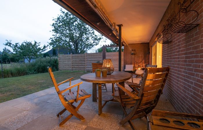 Spacious vacation apartment with garden, surrounded by greenery.